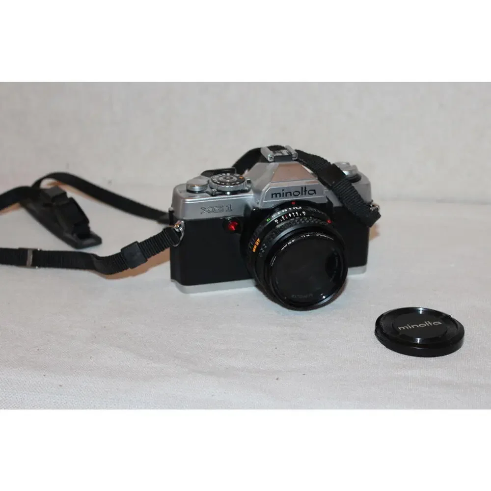 Vintage Minolta XG-1 35mm SLR Film Camera w/ Minolta Lens, Strap & Manual - Picture 1 of 4